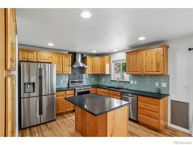 9073 Plainsman Drive, Wellington, CO 80549