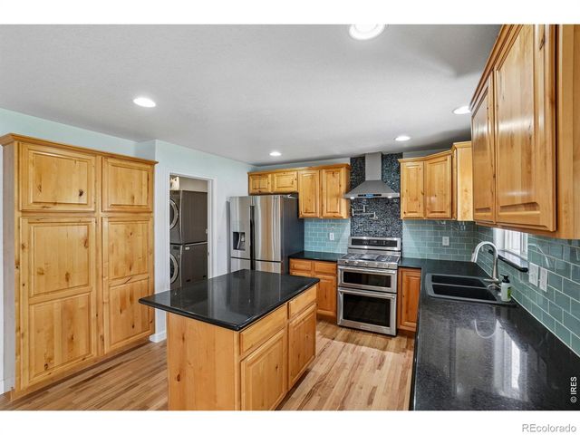 9073 Plainsman Drive, Wellington, CO 80549