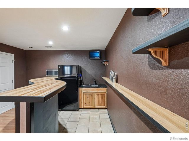 9073 Plainsman Drive, Wellington, CO 80549