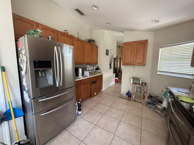 674 VINEYARD WAY 6747, Poinciana, FL 34759