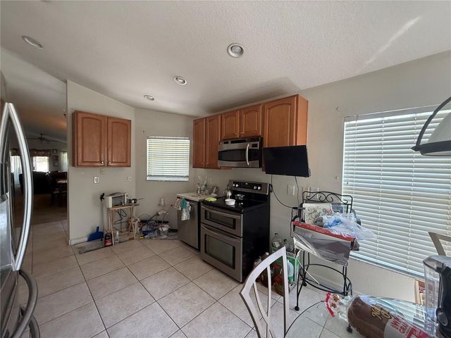 674 VINEYARD WAY 6747, Poinciana, FL 34759