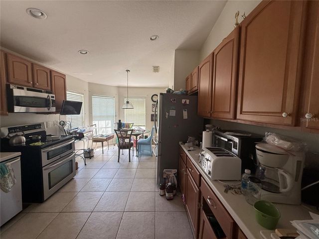 674 VINEYARD WAY 6747, Poinciana, FL 34759