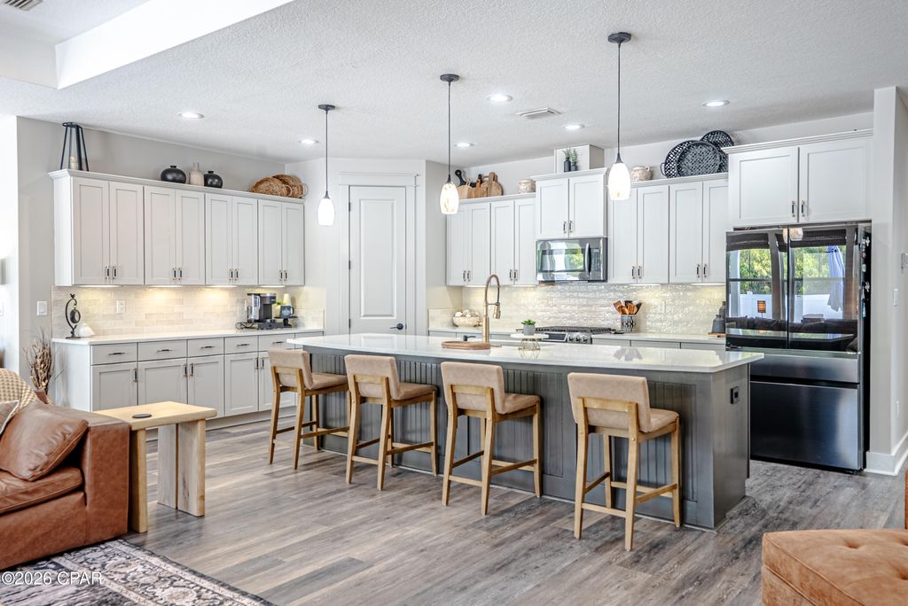 Image 7 of property listing at 211 Basin Bayou Drive, Panama City Beach, FL 32407