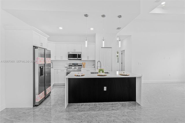 1113 Henry Avenue, Lehigh Acres, FL 33972
