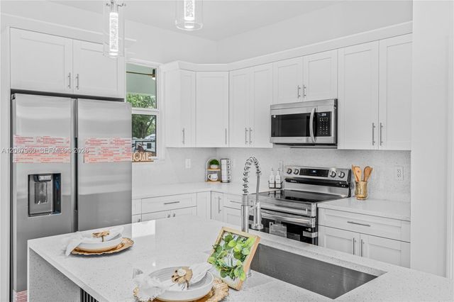 1113 Henry Avenue, Lehigh Acres, FL 33972