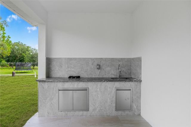 1113 Henry Avenue, Lehigh Acres, FL 33972