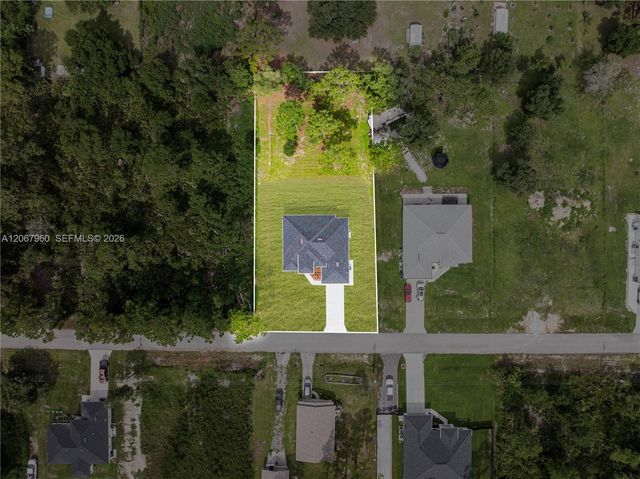 1113 Henry Avenue, Lehigh Acres, FL 33972