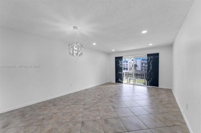 7722 Camino Real E-218, Miami, FL 33143