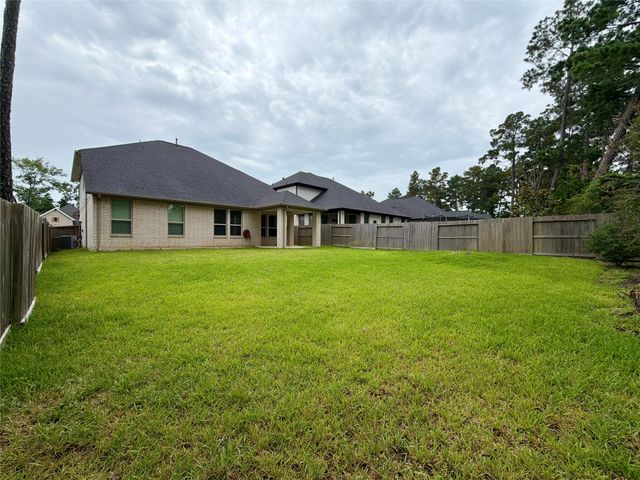 415 Northern Pike Drive, Willis, TX 77318