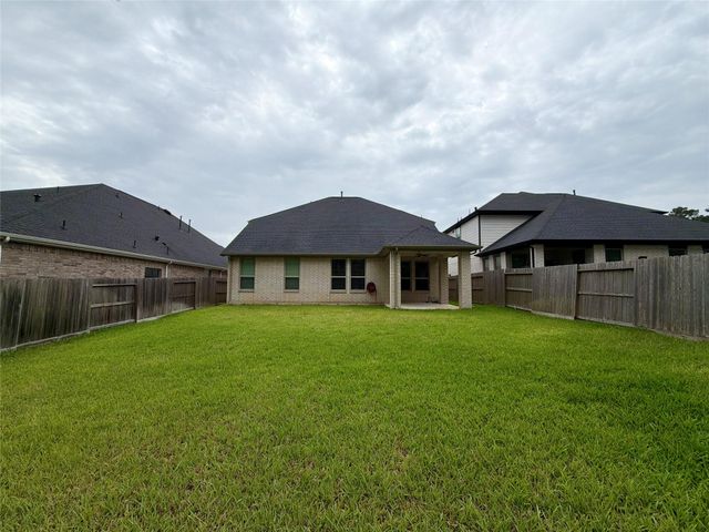 415 Northern Pike Drive, Willis, TX 77318