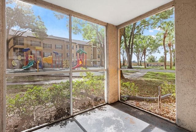 7606 PISSARRO DRIVE 104, Orlando, FL 32819