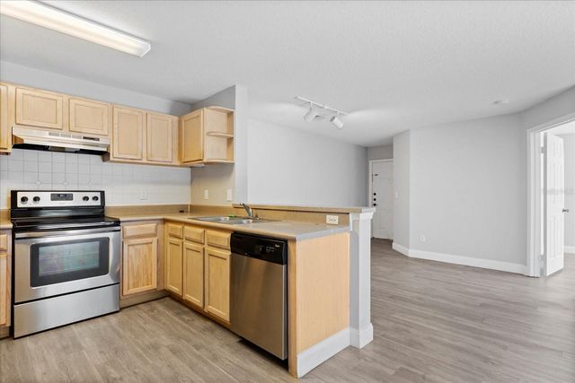 7606 PISSARRO DRIVE 104, Orlando, FL 32819