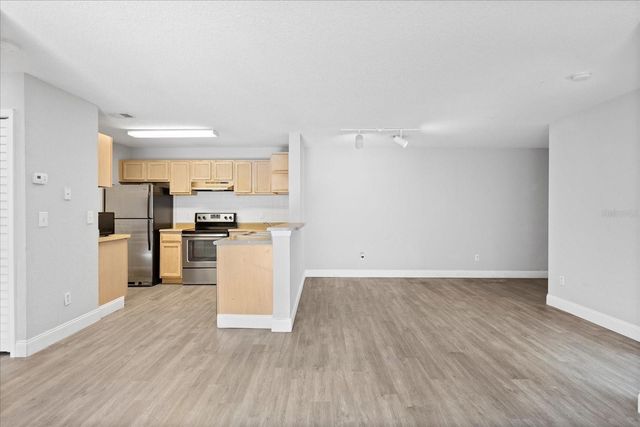 7606 PISSARRO DRIVE 104, Orlando, FL 32819