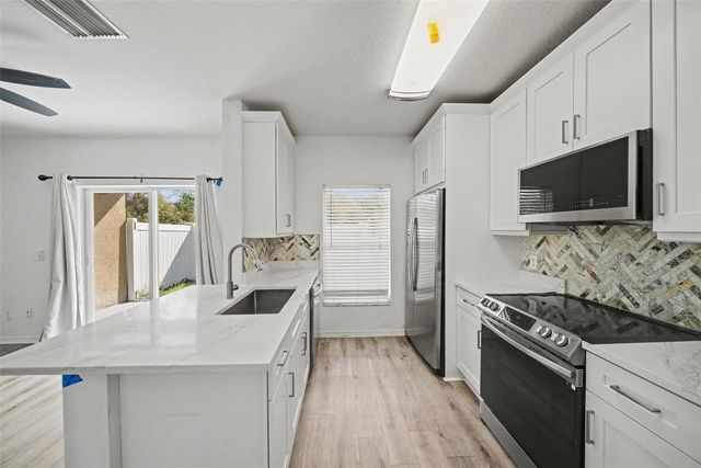 1246 CHARLESWORTH DRIVE, Wesley Chapel, FL 33543