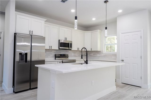 7780 N Sarazen Drive, Citrus Springs, FL 34434
