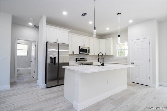 7780 N Sarazen Drive, Citrus Springs, FL 34434