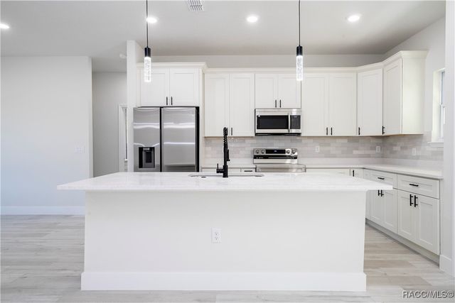 7780 N Sarazen Drive, Citrus Springs, FL 34434