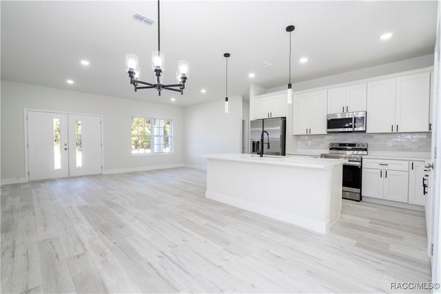 7780 N Sarazen Drive, Citrus Springs, FL 34434