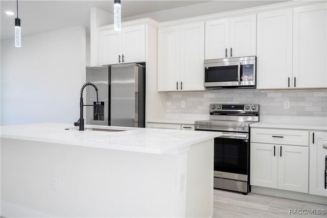 7780 N Sarazen Drive, Citrus Springs, FL 34434