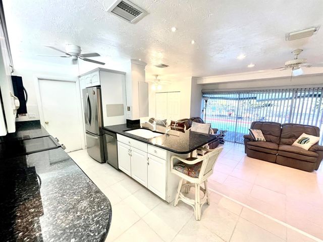 880 SE Degan Drive, Port St. Lucie, FL 34983