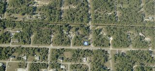 107 Moore Avenue, Lehigh Acres, FL 33936