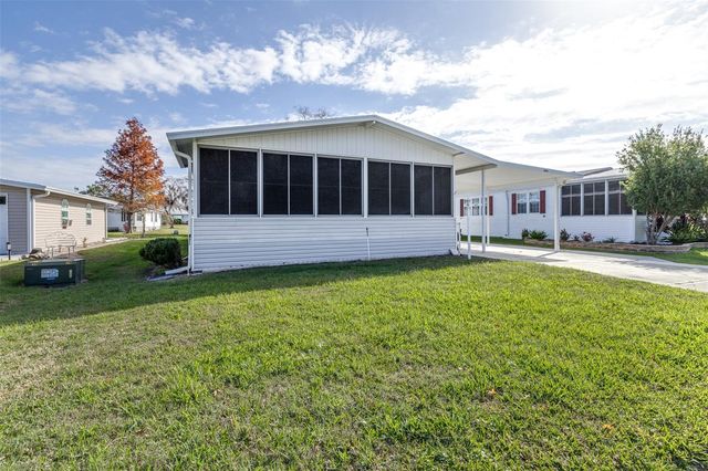 5453 WILLIAMSBURG LANE, Wildwood, FL 34785