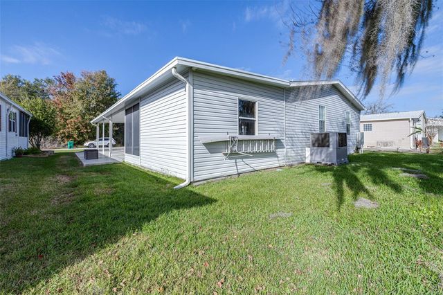 5453 WILLIAMSBURG LANE, Wildwood, FL 34785