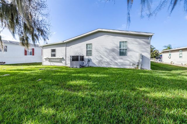 5453 WILLIAMSBURG LANE, Wildwood, FL 34785