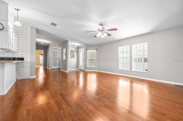 5453 WILLIAMSBURG LANE, Wildwood, FL 34785