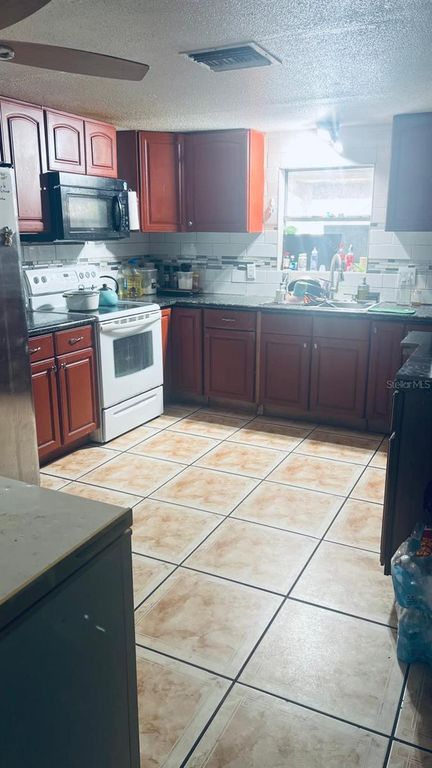 Image 4 of property listing at 1221 E 28TH AVENUE, Tampa, FL 33605