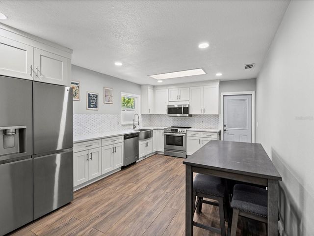 7910 W POCAHONTAS AVENUE, Tampa, FL 33615