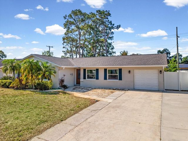 7910 W POCAHONTAS AVENUE, Tampa, FL 33615