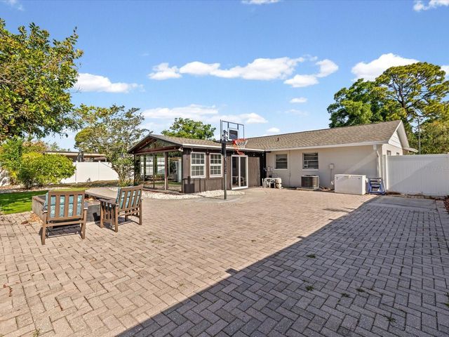 7910 W POCAHONTAS AVENUE, Tampa, FL 33615