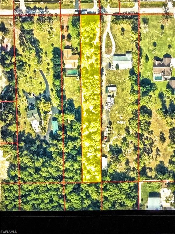 3890 27TH AVE SW, NAPLES, FL 34117 — exterior