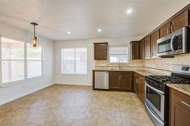 1403 High Thicket Court, Spring, TX 77373