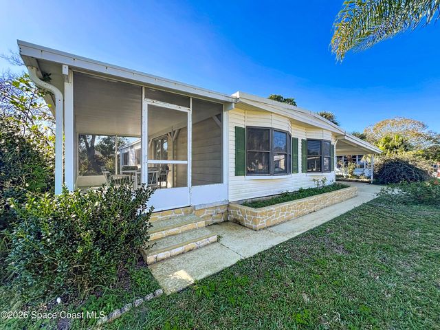 909 Sequoia Street, Barefoot Bay, FL 32976