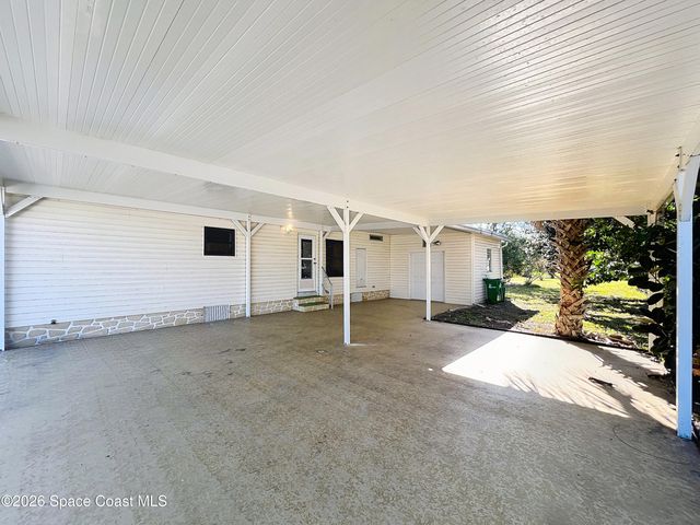 909 Sequoia Street, Barefoot Bay, FL 32976