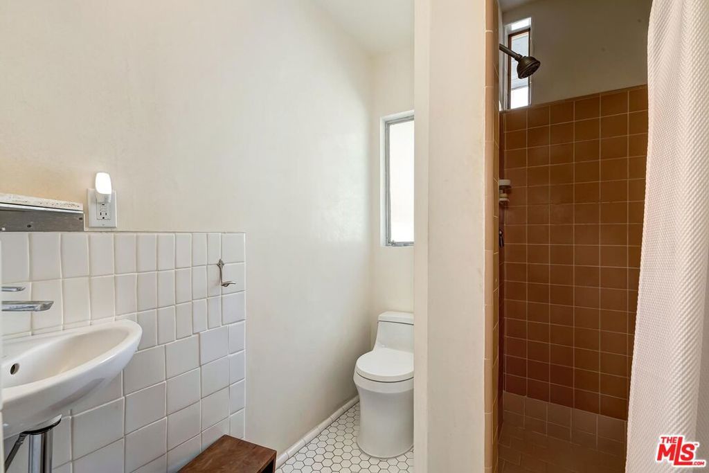 Image 25 of property listing at 4465 Don Miguel Drive, Los Angeles, CA 90008