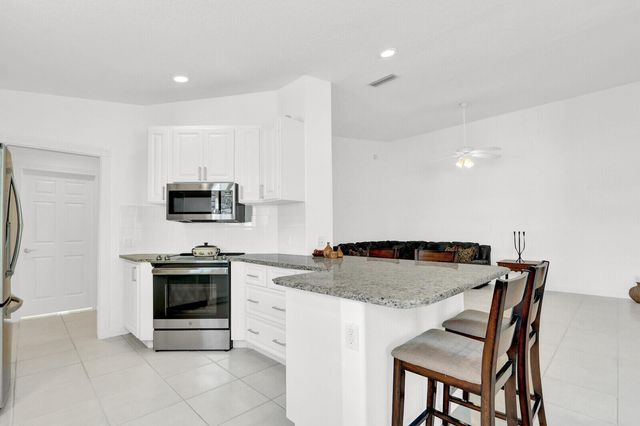 5181 Magnolia Bay Circle, Palm Beach Gardens, FL 33418