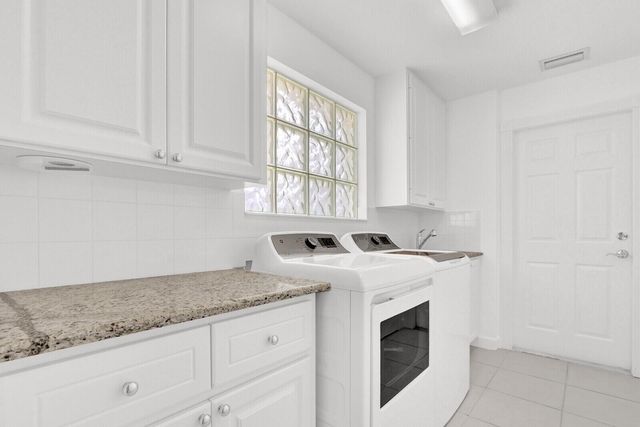 5181 Magnolia Bay Circle, Palm Beach Gardens, FL 33418