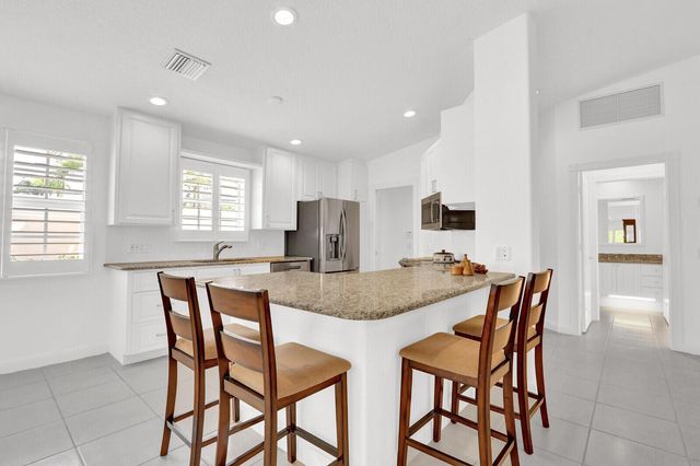 5181 Magnolia Bay Circle, Palm Beach Gardens, FL 33418