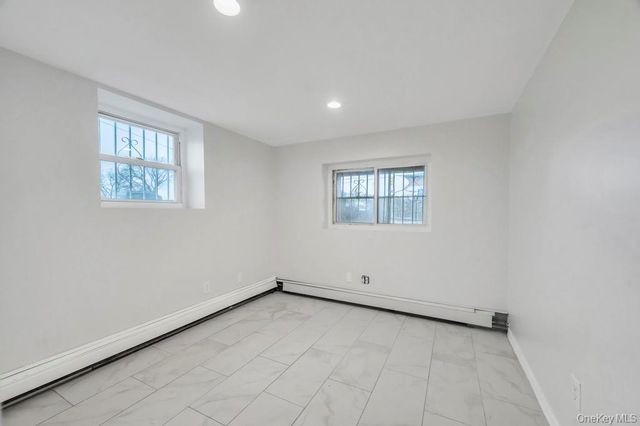 9402 23rd Avenue, East Elmhurst, NY 11369