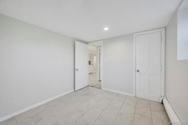 9402 23rd Avenue, East Elmhurst, NY 11369