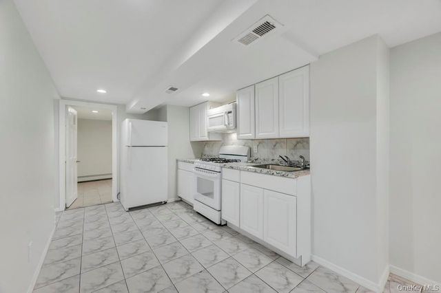 9402 23rd Avenue, East Elmhurst, NY 11369