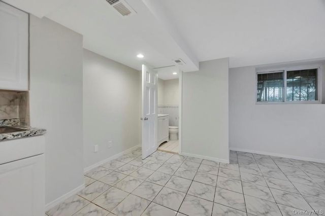 9402 23rd Avenue, East Elmhurst, NY 11369