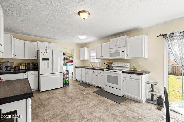 6097 Dutch Elm Drive, Joplin, MO 64804