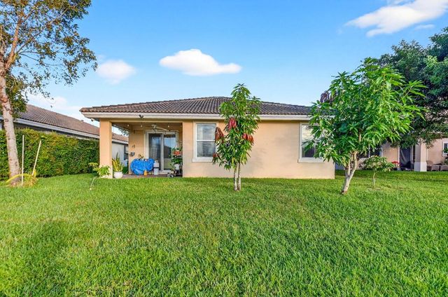 5640 Caranday Palm Drive, Greenacres, FL 33463