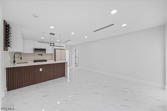 1053 Joponica AVE S, Lehigh Acres, FL 33974