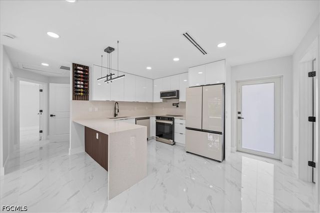 1053 Joponica AVE S, Lehigh Acres, FL 33974