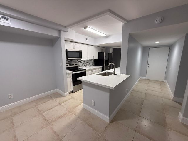 5760 Rock Island Road 309, Tamarac, FL 33319